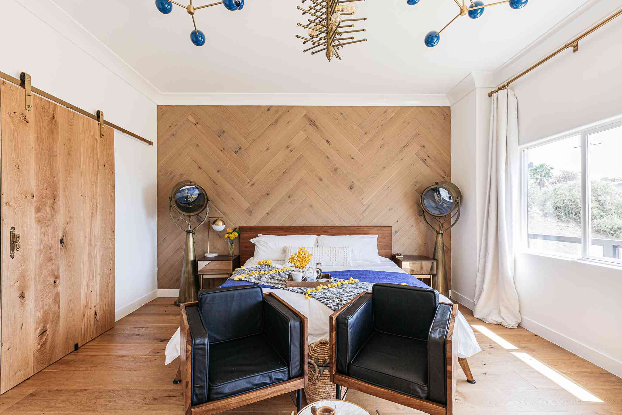 Luxury bedroom design with upholstered headboard, bedside tables, and modern décor