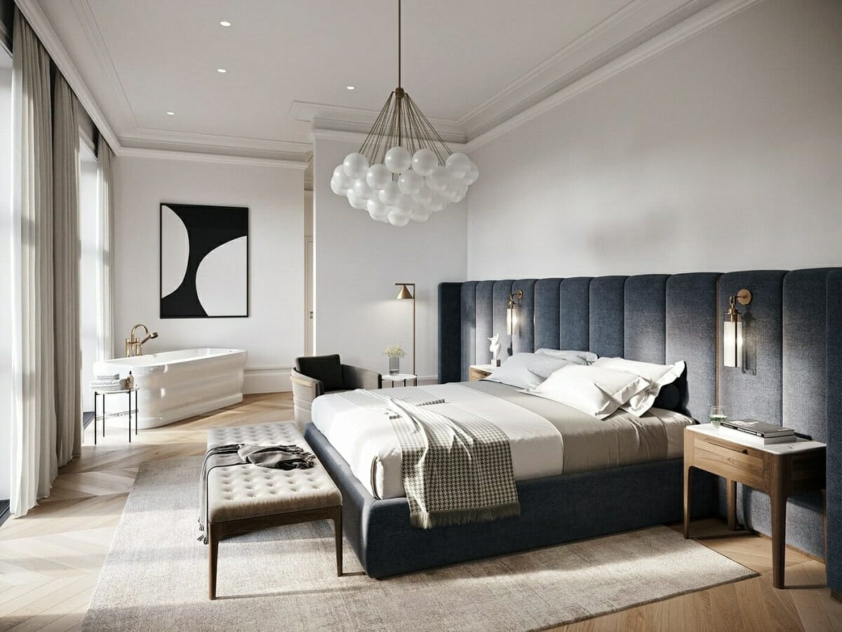 Elegant master bedroom design with soft neutral tones, upholstered bed, and modern lighting